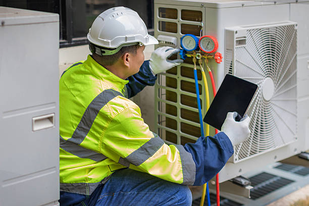 Professional Heat Pump Repair technician working in Stockwell, IN